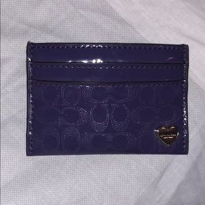 New purple Coach cards wallet